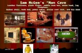 Sam McGee’s “Man Cave” Leather furniture, plank floors, saddle seat bar, moose head, log fireplace, barber chair, bunk bed, poker table, antler coat rack,
