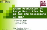 Charm Production at Large Rapidities in pp and dAu Collisions at RHIC