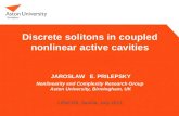 Discrete solitons in coupled  nonlinear active cavities